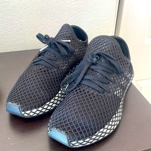 Adidas Deerupt double black size 8 in women’s size.